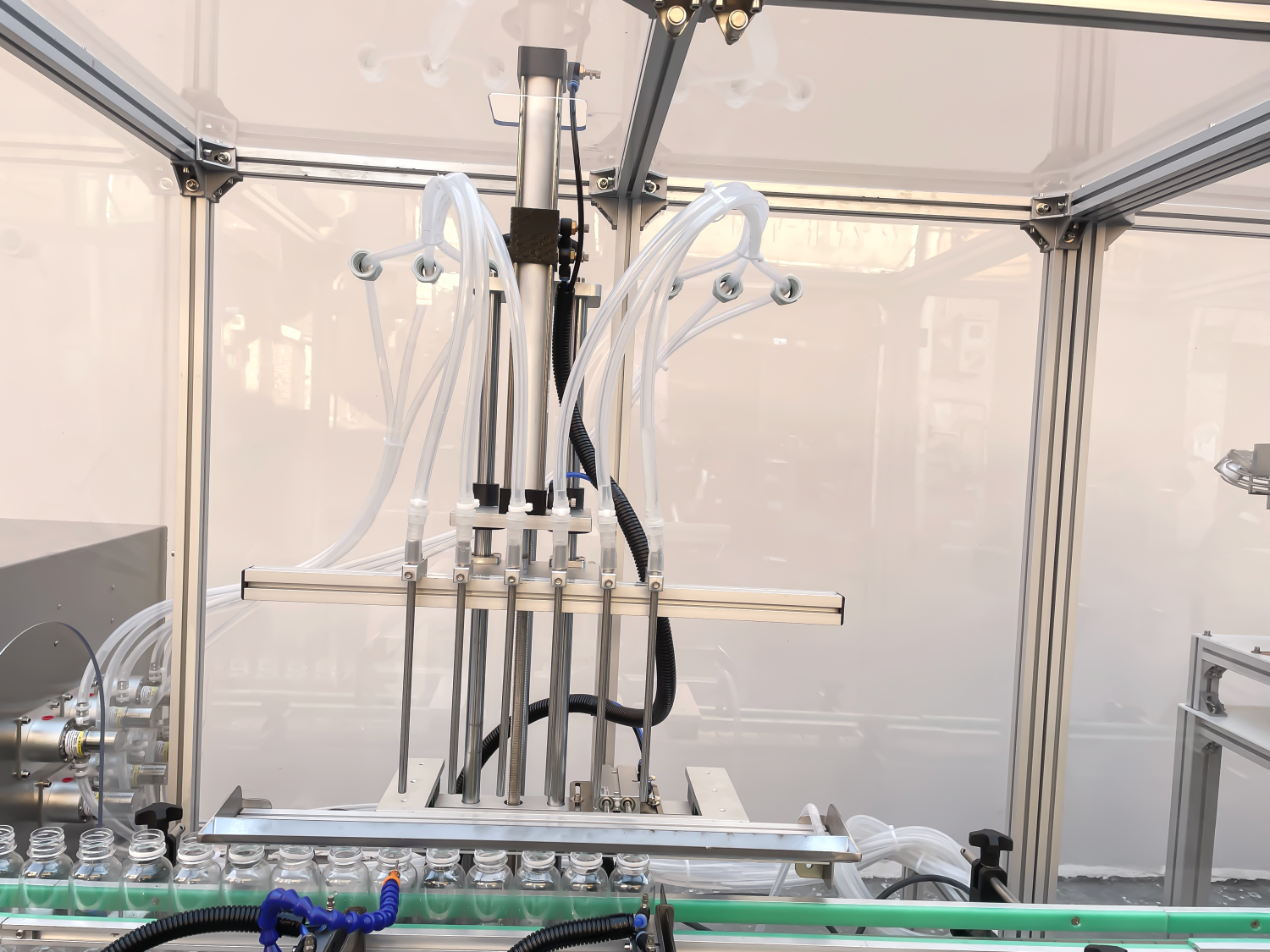 Six-head beverage filling machine with dust cover, upper cover, screwing cap, and labeling assembly line